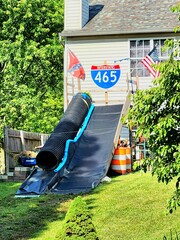 MAGA playground with Confederate flag and stolen highway equipment