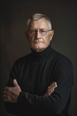 A portrait of an elderly man wearing a black turtleneck and glasses, exuding wisdom and seriousness, against a dark background.
