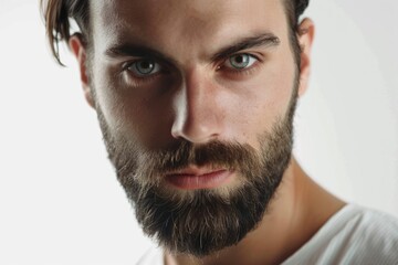 Fototapeta premium Attractive young man with stylish beard on white background.