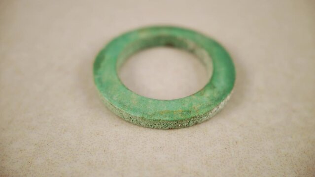 Close-Up of a Used Green Rubber O-Ring