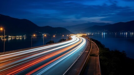 Car light trails on the road at night. Long exposure