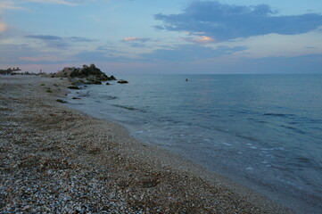 seashore at sunset, summer atmosphere and calmness