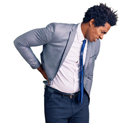 Handsome african american man with afro hair wearing business jacket suffering of backache, touching back with hand, muscular pain