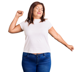 Middle age latin woman wearing casual white tshirt stretching back, tired and relaxed, sleepy and yawning for early morning