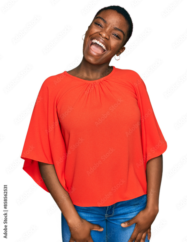 Poster Young african american woman wearing casual clothes winking looking at the camera with sexy expression, cheerful and happy face.