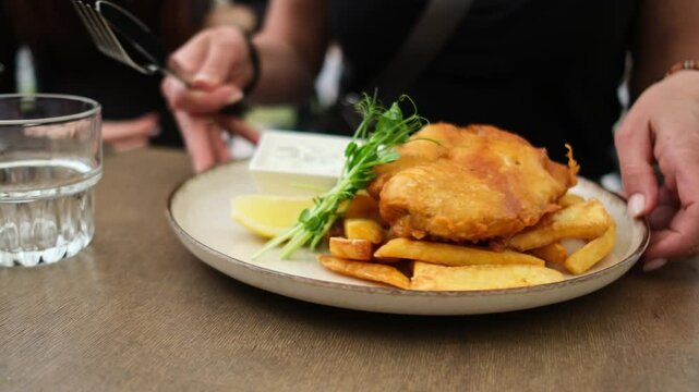 Woman Ordered A Classic Fish And Chips Dish At A Cafe