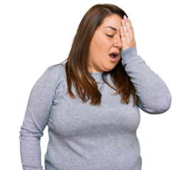Beautiful brunette plus size woman wearing casual clothes yawning tired covering half face, eye and mouth with hand. face hurts in pain.