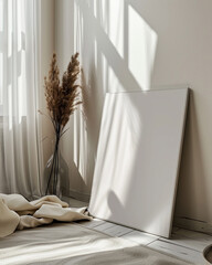 Close up of a poster mockup, of a white poster, leaning on the wall in a modern home