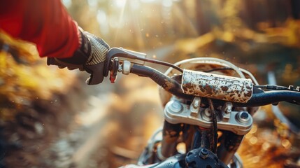 A person is riding a dirt bike on a trail