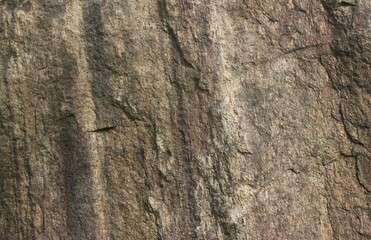 Mountain rock texture. Natural black slate granite slab marble stone ceramic seamless tile rough surface background.