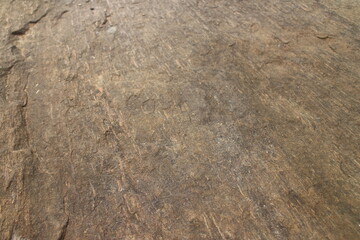 Mountain rock texture. Natural black slate granite slab marble stone ceramic seamless tile rough surface background.