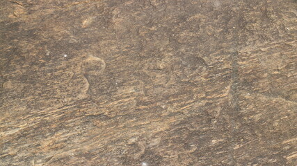 Mountain rock texture. Natural black slate granite slab marble stone ceramic seamless tile rough surface background.
