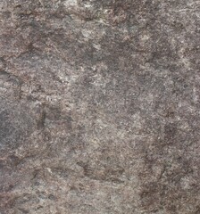 Mountain rock texture. Natural black slate granite slab marble stone ceramic seamless tile rough surface background.
