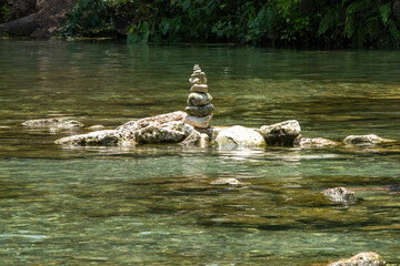 Stacked rocks in a river
