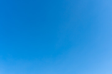 Beautiful blue sky without clouds in the morning or evening used as natural background texture in decorative art work