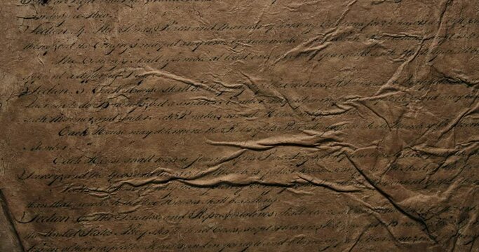 Panning across US American declaration of independence, stopping at We The People on old style parchment. For American Independence Day on the 4th of July, or other patriotic American celebrations.