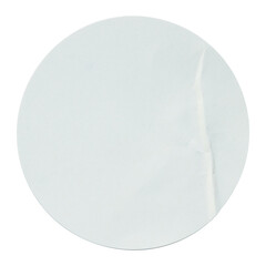Blank white round adhesive paper sticker label isolated on white background.