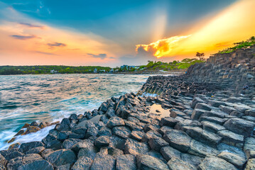 Sunset over basalt columns Giant's Causeway known as UNESCO World Heritage Site, Phu Yen, Vietnam