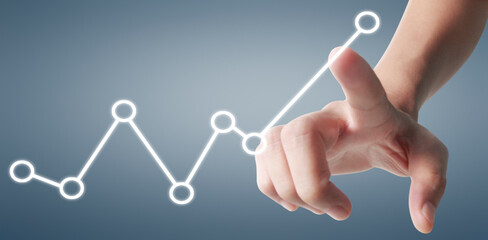 Hand touching graphs of financial indicator and accounting market economy analysis chart