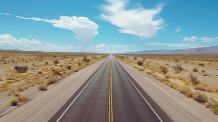 Long straight road in a desert landscape