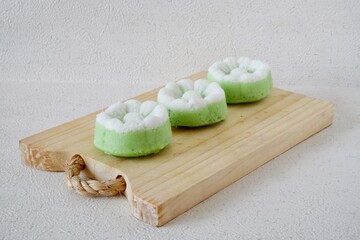 Indonesian Traditional steamed cake Kue Putu Ayu, made from rice flour, grated coconut and pandanus