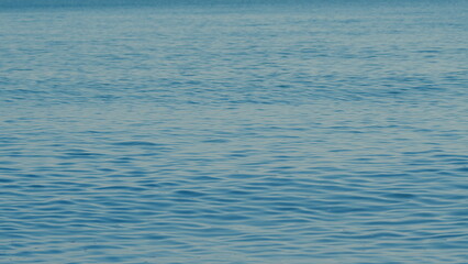 Calm Blue Sea And Gradient Sky Background. Crystal Clear Sea Water Exotic And Relaxing Texture.