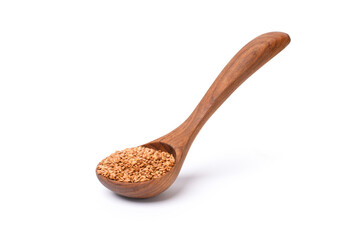 Flax seed in wooden spoon isolated on white background with clipping path.