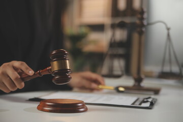 Law theme, gavel or mallet of the judge, lawyer enforcement officers, evidence-based cases taken into account in the court abount business, legislation.