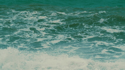 Obraz premium Stormy Sea. Power Of Waves Breaking Splashing. Mighty Ocean Wave Rolling Slowly And Crashing Against Coast.