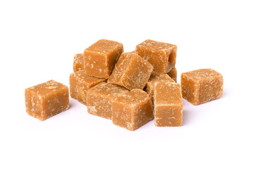 Brown cane sugar cubes isolated on white background.