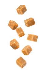 Brown sugar cubes isolated on white