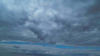 Gray Rainy Clouds Float Across Dark Sky. Tornado Clouds. Natural Background. Rainy Sky.