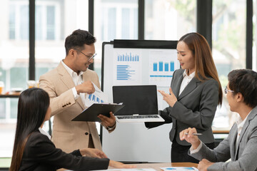 Asian Business Group Chat about graph work Present in meetings, in the office