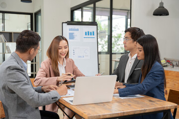 Asian Business Group Chat about graph work Present in meetings, in the office