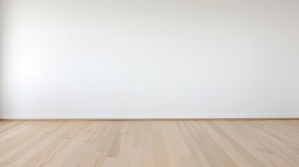 A photo of a large plain white wall with a light wood floor