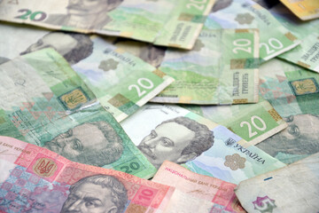Processed collage of Ukrainian Hryvnia UAH bills banknotes texture. Background for banner