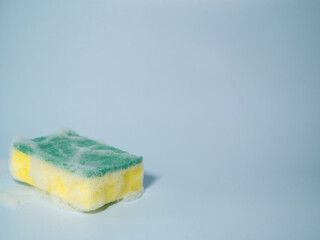 Close-up of Yellow Dish Washing Sponge,foamy cleaning sponge