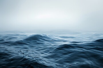 A vast and stormy ocean under a cloudy sky. The waves crash and churn in the distance.