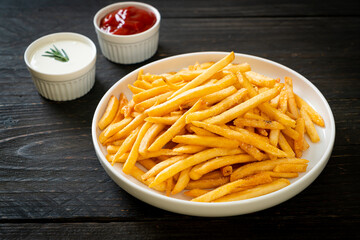 French fries with sour cream and ketchup