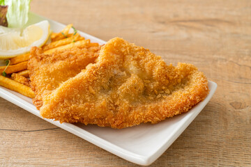 fish and chips - fried fish fillet with potatoes chips