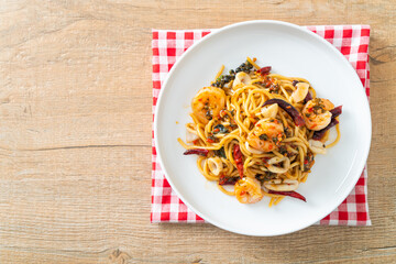 spicy spaghetti seafood on plate
