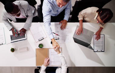 High Angle View Of Business People Taking An Interview