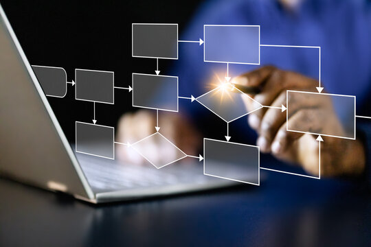 Young African American businessman implementing hologram technology