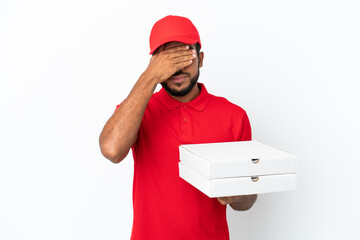 pizza delivery man picking up pizza boxes isolated on white background covering eyes by hands. Do not want to see something