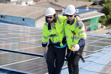 Unconscious worker getting help from his college after fainted while working with solar panels