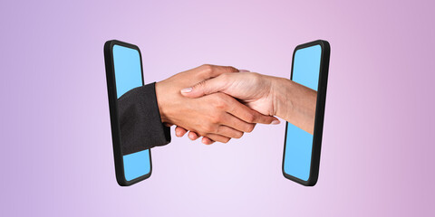 Two hands shaking extending from smartphones on pink background. Concept of virtual agreement or business deal