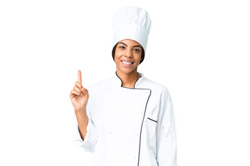 Young African American chef over isolated chroma key background showing and lifting a finger in sign of the best