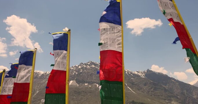 Wind horses Lung ta prayer flags hang along mountain path Tibetan prayer flags 