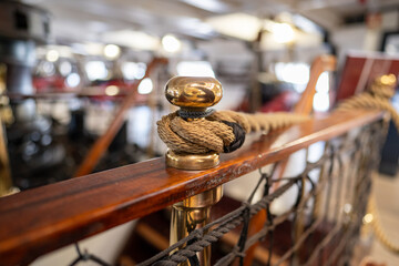 ropes and shiny details inside an antique sailing ship