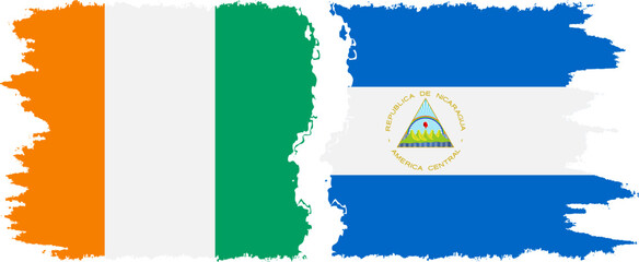 Nicaragua and Ivory Coast grunge flags connection vector